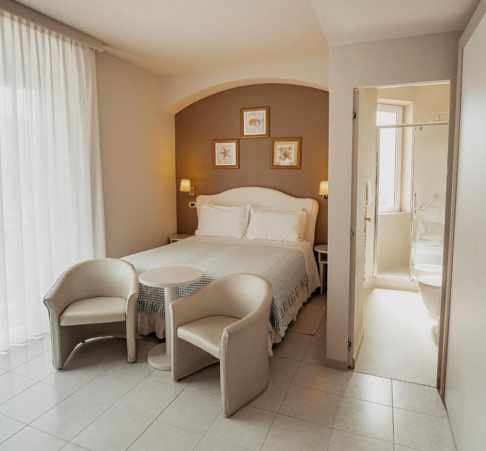 Hotel Eden Cinquale Bagian luar foto